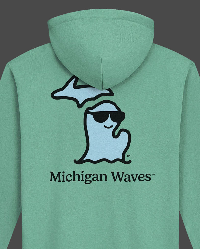 Michigan Waves apparel brand logo on a green hoodie.
