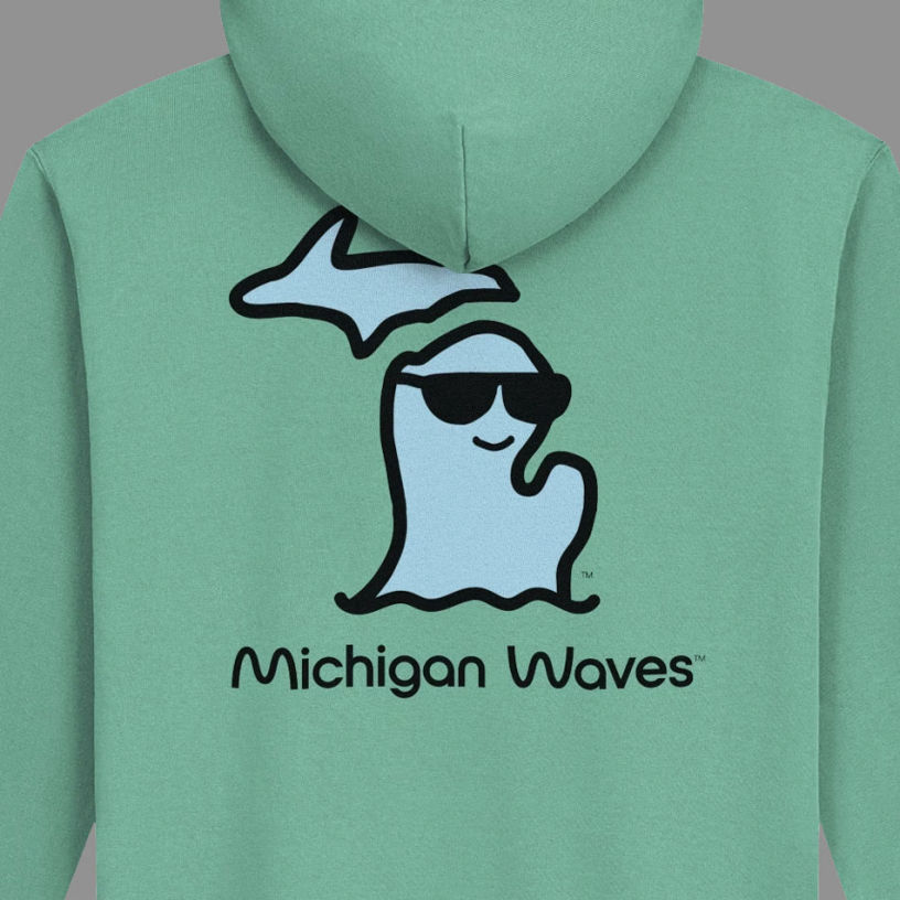 Michigan Waves apparel brand logo on a green hoodie.